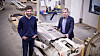 Alexander Iversen, teamlederen for ingeniørene i Sub Sea Services, og CEO Bernt Arne Breistein står foran selskapets ROPS montert på en raiser.