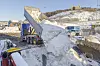 Lastebiler leverer snøen til NCC. Foto: Arash A. Nejad