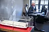 Daglig leder i Asko Maritim, Kai Just Olsen, på kontoret sitt i Horten. Modell av den første dronen i forgrunnen.