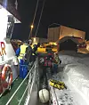 Redningsmannskaper under evakuering under snøkaoset i Lofoten. På et døgn var snømengden da økt med 65 centimeter til totalt 130 centimeter Foto: Redningsskøyta Det Norske Veritas