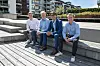 Accentures prosjektleder Lars Nydal Johansen sammen med NTNU-studentene Ole-Christian Bjerkeset, Peter Nikolai Sundgaard og André Egeli. Foto: TUM Studio