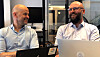 Daglig leder i Computas Danmark Jon-Gunnar Aasen (t.v.) og administrerende direktør i SharkCell Frederik Brøns feirer sammenslåingen. Foto: Computas