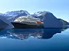 Nye kystruteskip for Bergen-Kirkenes kan ha 60 prosent lavere CO2-utslipp sammenliknet med de nye ekspedisjonsskipene til Hurtigruten. Med batteridrift ladet fra landstrøm, kan skipet gå rundt fire timer på batteri, blant annet i Geirangerfjorden og til og fra kai. Foto: LMG/Gasnor/Norwest3D
