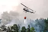 Også Norge har fått opplevd en ødeleggende storbrann som brøt ut i Krokstadelva i Drammen i sommer. Helikoptre ble satt inn i slukkingen av brannen som spredte seg fra rekkehus. Foto: Thomas Fure