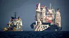 Rørleggingsfartøyet Audacia under legging av Nord Stream 2 fotografert nær øya Rügen i november 2018 med et norsk offshorefartøy ved siden av.
