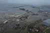 En russisk kystby ble rammet av tsunamibølgene kort tid etter jordskjelvet på Kamtsjatka-halvøya natt til onsdag. Foto: Geofysisk tjeneste ved det russiske vitenskapsakademiet / AP / NTB