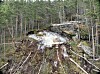 Vegvesenets bilder fra stedet viser hvordan fjellblokkene som har rast ut har sklidd på et underlag av is.
