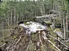 Vegvesenets bilder fra stedet viser hvordan fjellblokkene som har rast ut har sklidd på et underlag av is.