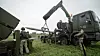 Nasams III-utskytningsrampe («canister launcher») lades med AIM-120 Amraam treningsmissiler under Iron Wolf-øvelsen i Litauen i mai 2023.