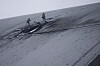 Bildet viser skjoldet som beskytter restene av reaktor nummer fire ved det tidligere kjernekraftverket i Tsjernobyl, etter at det ble truffet under et droneangrep i februar 2025. Skjoldet er bygget for å hindre at radioaktivitet slipper ut.