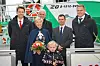 Per Olav Myrstad, her bak kvinnen i bunad, er styreleder i rederiet GMI. Her fra en dåp av en båt da han var styreleder i rederiet FSV.