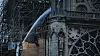 Selve strukturen som holder Notre-Dame-katedralen oppe er reddet etter storbrannen mandag kveld. Spiret og store deler av taket gikk tapt. Foto: AP/NTB Scanpix