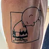 Lars Erik Lund har galgenhumor rundt depresjonen sin. Denne tatoveringen fra Snoopy-tegneserien tok han i høst. Charlie Brown står i sin «depresjonsstilling» og sier at det er viktig å stå med hodet bøyd for å holde seg deprimert. Foto: Privat