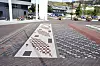 «Teppe Ålgård» er en kunstnerisk utsmykking, et teppe vevd i teglsten, laget av kunstnerduoen Løvaas & Wagle. Teppet binder busstasjonen sammen med kanalparken.