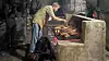 Joakim Gitlestad griller selvslaktet geit for staben. Foto: Privat
