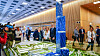 Statsminister Erna Solberg, konsernsjef Øyvind Eriksen i Aker (th) og administrerende direktør Nina Jensen i REV Ocean ser på en modell av den 200m høye bygningen til Kjell Inge Røkke som skal en gang skal huse World Ocean Headquarters (WOH), et verdensledende havsenter, på Fornebu.