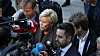Finansminister Siv Jensen på vei fra Finansdepartementet til Stortinget for å legge frem neste års statsbudsjett.