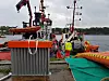 Flere fiskefartøy og to private slepefartøy deltok i oljevernøvelsen Scope 2017. I forgrunnen en paravane som sørger for å spre lensearmen ut og skape et så stort oljefangstområde som mulig. Foto: Tore Stensvold