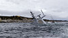 Den havarerte fregatten KNM Helge Ingstad fotografert onsdag 14. november. En amerikansk offiser som var om bord under havariet skal avhøres av politiet.