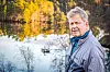 Grunneier Didrik Fasmer fortalte at vannkvaliteten i Storavatnet og Alvøvatnet, familiens drikkevannskilde, har endret seg kraftig etter at utfyllingen startet. Foto: Marius Valle