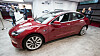 Tesla Model 3 stilt ut under bilmessen i Paris.