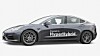 Obrist Powertrain bygde om en Tesla Model 3 til en hybrid med forbrenningsmotor.