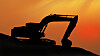 Silhouetted Digging Machine