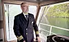 Kaptein Truls Bruland på Havila Castor, som seiler utslippsfritt gjennom Geirangerfjorden for første gang. Foto: Havila Kystruten