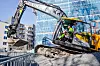 En elektrisk gravemaskin på Sophies Minde byggeplass i Oslo.