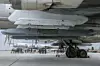 Kh-101-kryssermissiler henger under vingene på et russisk Tupolev Tu-95-bombefly. Bildet er flere år gammelt.