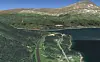 Illustrasjon av vei i dagen sørøst mot Sørbotn. I bakgrunnen kan man skimte brua over Ramfjorden og Lauksletta. Illustrasjon: Statens vegvesen