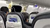 Verken passasjerer eller besetningsmedlemmer kom til skade da nødutgangen ble revet ut og etterlot et gapende hull mens et fly fra Alaska Airlines var i lufta fredag.