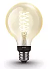 Retro: Hue Filament E27 ser ut som en gammel glødetråd, men det er en LED-lampe som har fått en diode og fosfor formet som en glødelampe. Foto: Signify