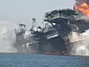 SANK: Transocean-riggen Deepwater Horizon brant i to dager før den tipper over og synker, kraftig skadet. Stigerør var fortsatt koblete på og knekker. Olje lekker ut fra stigerøret.