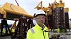 Her står Sverre Overå på Aker Solutions verft i Egersund foran undervannsinstallasjonen til første brønn som skulle bores for CO2-lagring i Northern Lights-prosjektet. Brønnen var ferdig boret i mars i år. Foto: Equinor