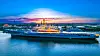 Det tidligere sovjetiske hangarskipet «Kiev» ligger til kai i den kinesiske byen Tianjin, der skipet er en del av en temapark. Foto: Tianjin Binhai TEDA Aircraft Carrier Tourism Group Co.,Ltd