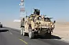 Amerikansk HMT Extenda med britisk og australsk personell, i tillegg til amerikansk, i Afghanistan i 2011. Foto: Supacat