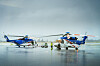 To Sikorsky S-92A-helikoptre på Flesland Heliport.
