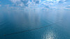 Ocean Cleanup Barrier sliter med å samle plast. Selskapet prøver å finne ut hvordan problemet skal løses. Illustrasjon: Ocean Cleanup.