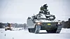 To CV90 stormpanservogner fra Telemark Bataljon på Tolga under Trident Juncture i fjor høst.