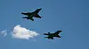 F-16 680 forlater Kjeller som siste fly på fasevedlikehold, og får følge av F-16B 689 et ørlite stykke på veien. Foto: Eirik Helland Urke