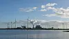 Olje- og gassprisen øker kraftig etter invasjonen av Ukraina. Betyr det at investeringslysten i fossil energi øker? Bildet er fra Eemshaven, et industriområde i Nederland som blander gasskraft, bioenergi og vindkraft.