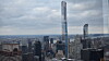 Fasaden til det 472 meter høye tårnet består av over 4500 tonn glass og aluminium.
