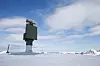 Forsvarsmateriell har utløst en opsjon de hadde på tre radarer. Bildet viser Sindre II radar på Innhesten på Senja i Troms.