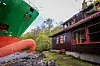 Et 135 meter langt konteinerskip gikk på grunn i Trondheimsfjorden utenfor Byneset. Det havnet på land ved en bolig.