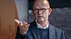 NHO-direktør Ole Erik Almlid peker på at bedriftenes kostnader knyttet til arbeidsgiveravgiften neste år øker, selv om partiene som har forhandlet om statsbudsjettet har gitt uttrykk for at de er imot.