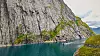 Brim Explorers elektriske passasjerbåter er superenergieffektive og lette. Her sklir en av båtene stille i vannet til Trollfjorden i Nordland.