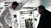 T.v.: Espen Larsen-Hakkebo viser elektrotavla som er «hjernen» i MS Brisen: De to kompakte ComPact NSX effektbryterne nede i bildet sørger for både sikkerhet. Med integrert Micrologic 5E-vern kan de både måle og kommunisere strømdata. Foto: Stefania Nilsen / Schneider Electric