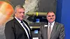 Nammo-sjef Morten Brandtzæg (t.v) og Jim Leary, som er sjef for med våpenforretningsutvikling i Boeing, foran en utstillingsmodell av Ramjet 155-granaten på AUSA i Washington D.C. Foto: Nammo