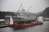 KNM Helge Ingstad på lekteren BOA Barge 33 ved Haakonsvern. Nå er den sendt til opphugging. Foto: Tore Stensvold